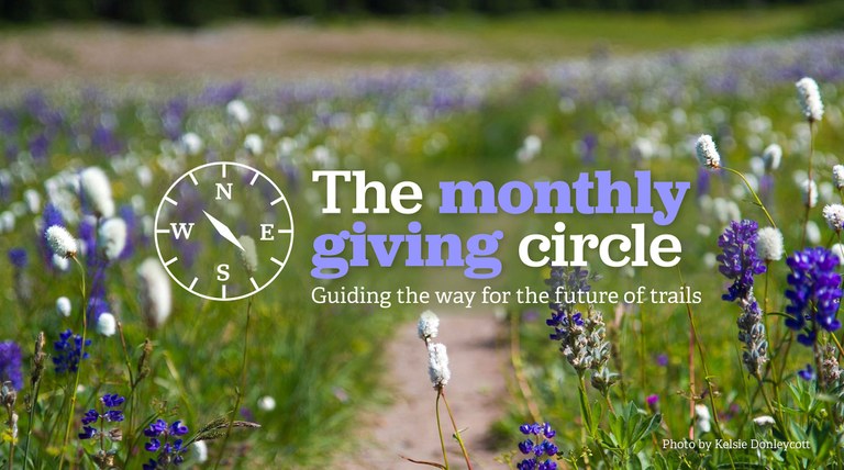 Text: The monthly giving circle. Guiding the way for the future of trails. Image: A transparent compass over a phot of purple and white wildflowers. Photo by Kelsie Donleycott.