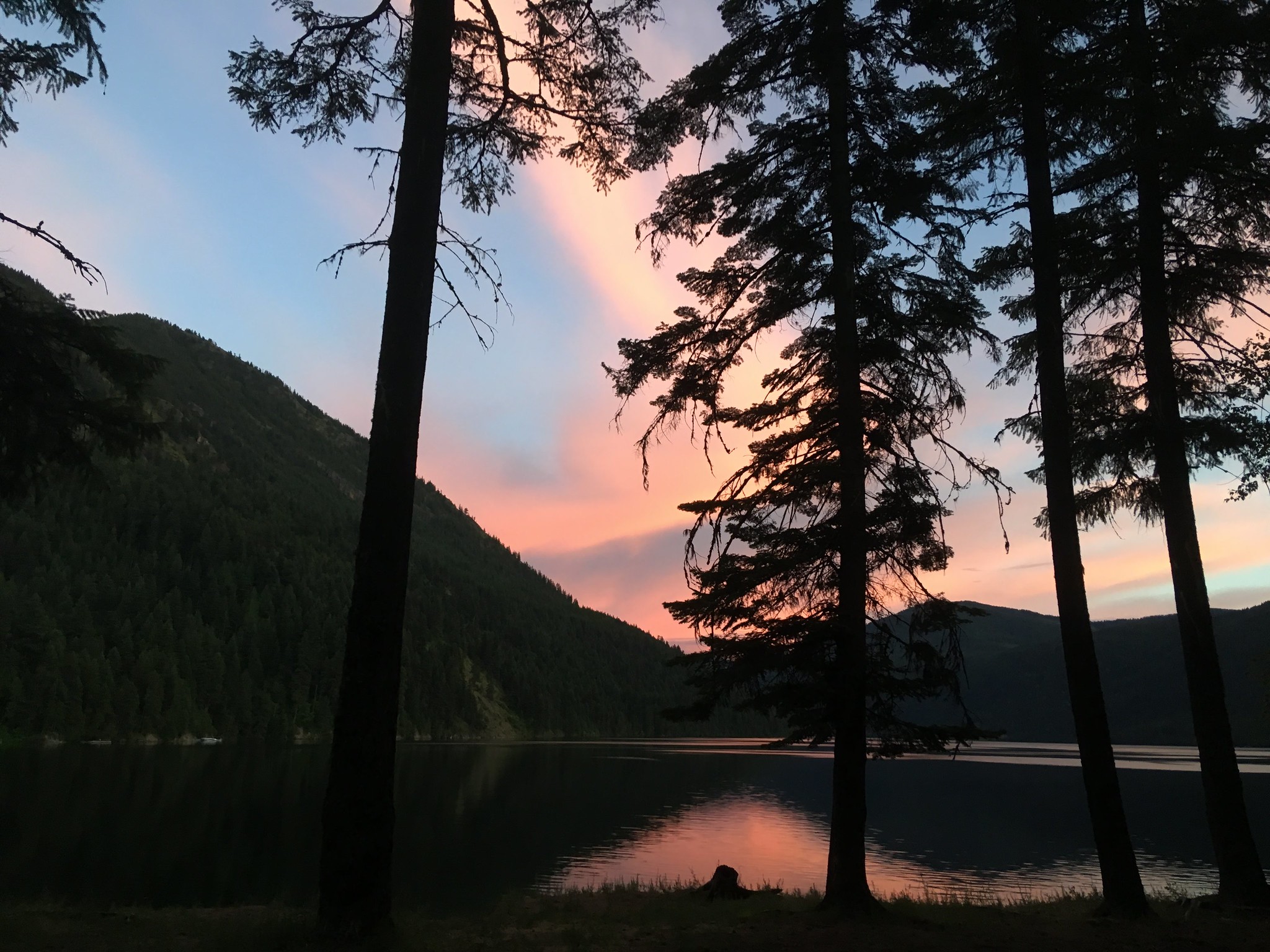A colorful sunset over the water at Sullivan Lake.
