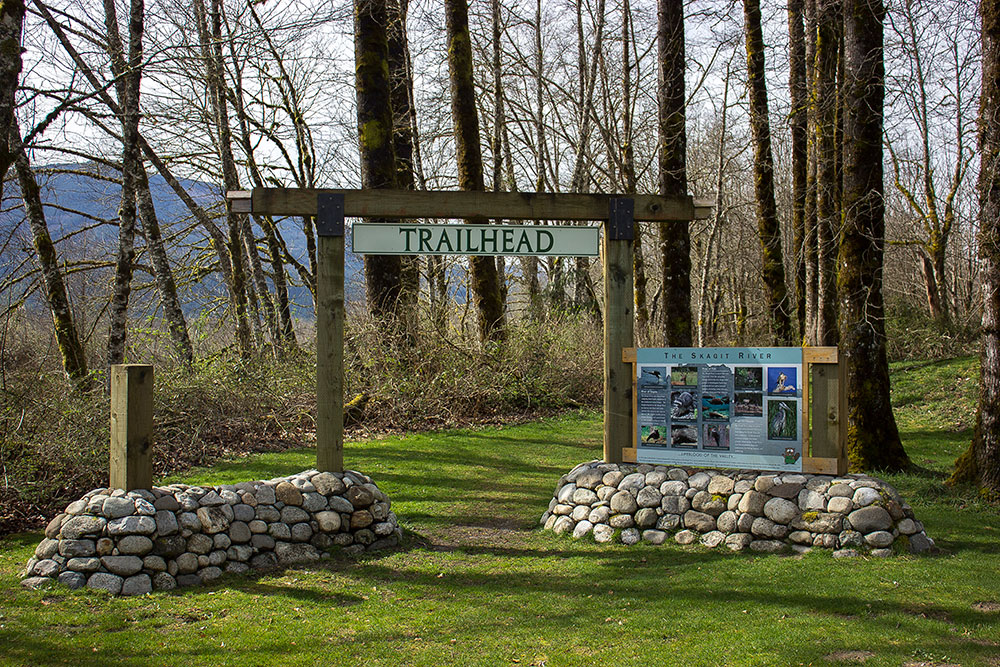 Arch over the trailhead and an informational sign at Howard Miller Steelhead Park. Photo by Alistair.