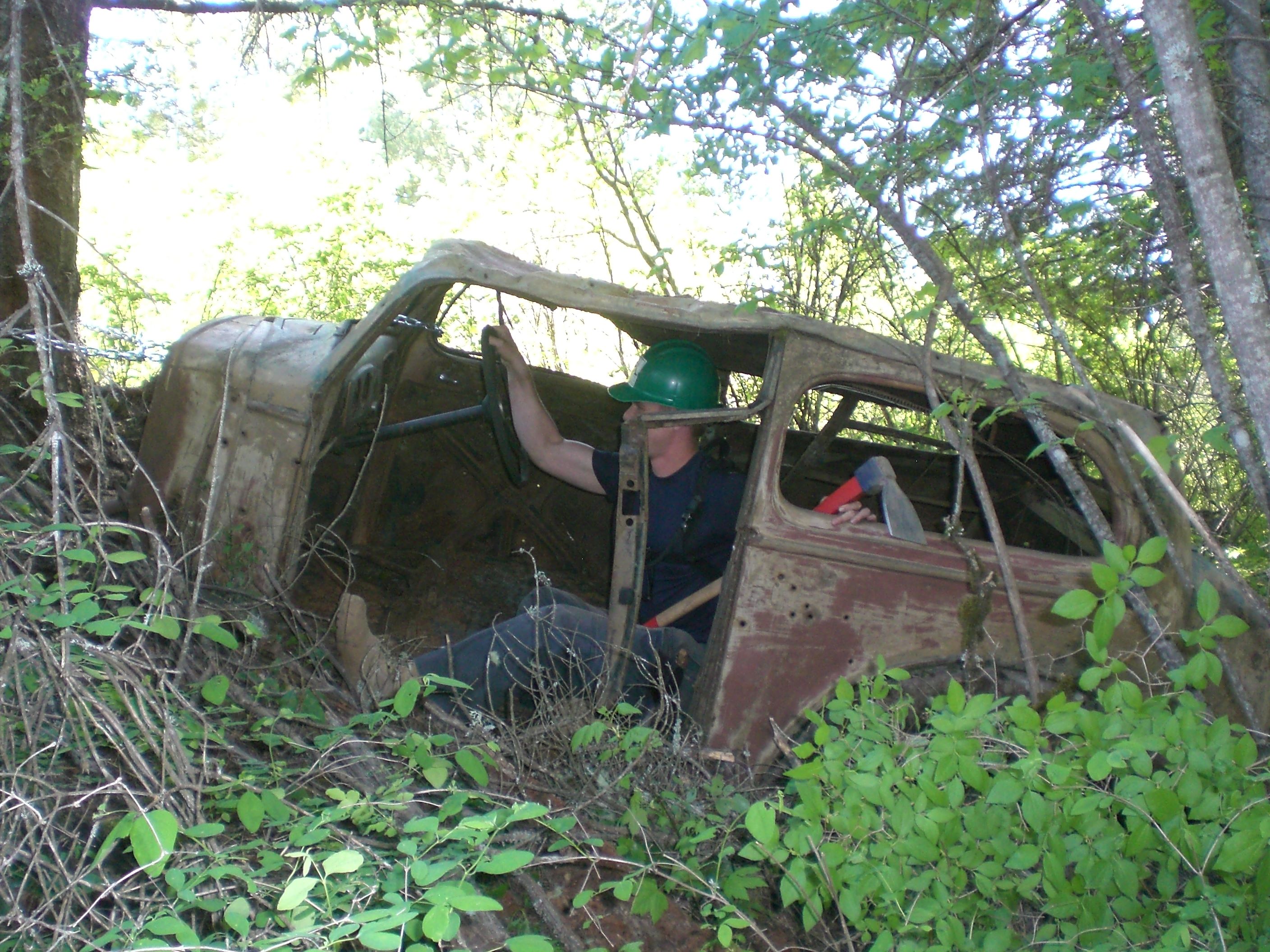 Car in Liberty Lake Regional Park. Photo by Holly Weiler. Abandoned 1930s car on the Split Creek Loop trail in Liberty Lake Regional Park. Photo by Holly Weiler.