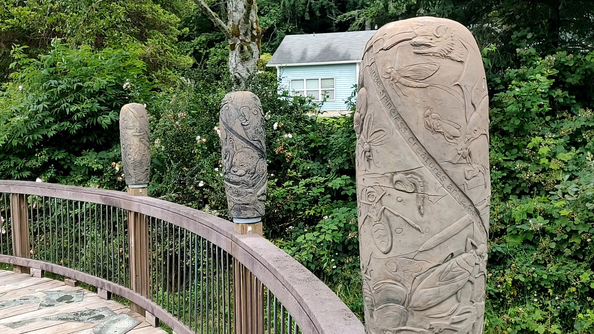 Art at Willapa National Wildlife Refuge. Photo by Icee. Carved art on the wooden railing on the Art Walk trail at Willapa National Wildlife Refuge. Photo by Icee.