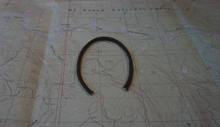 Horseshoe loop shape. A horseshoe shape on a hiking map.