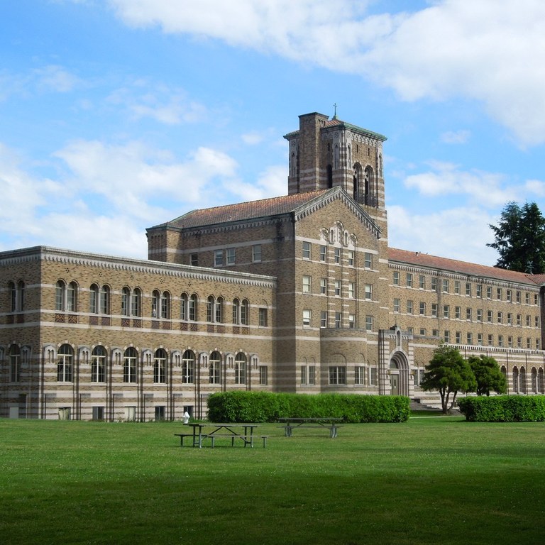 The old seminary building at Saint Edward State Park stands over a manicured landscape.