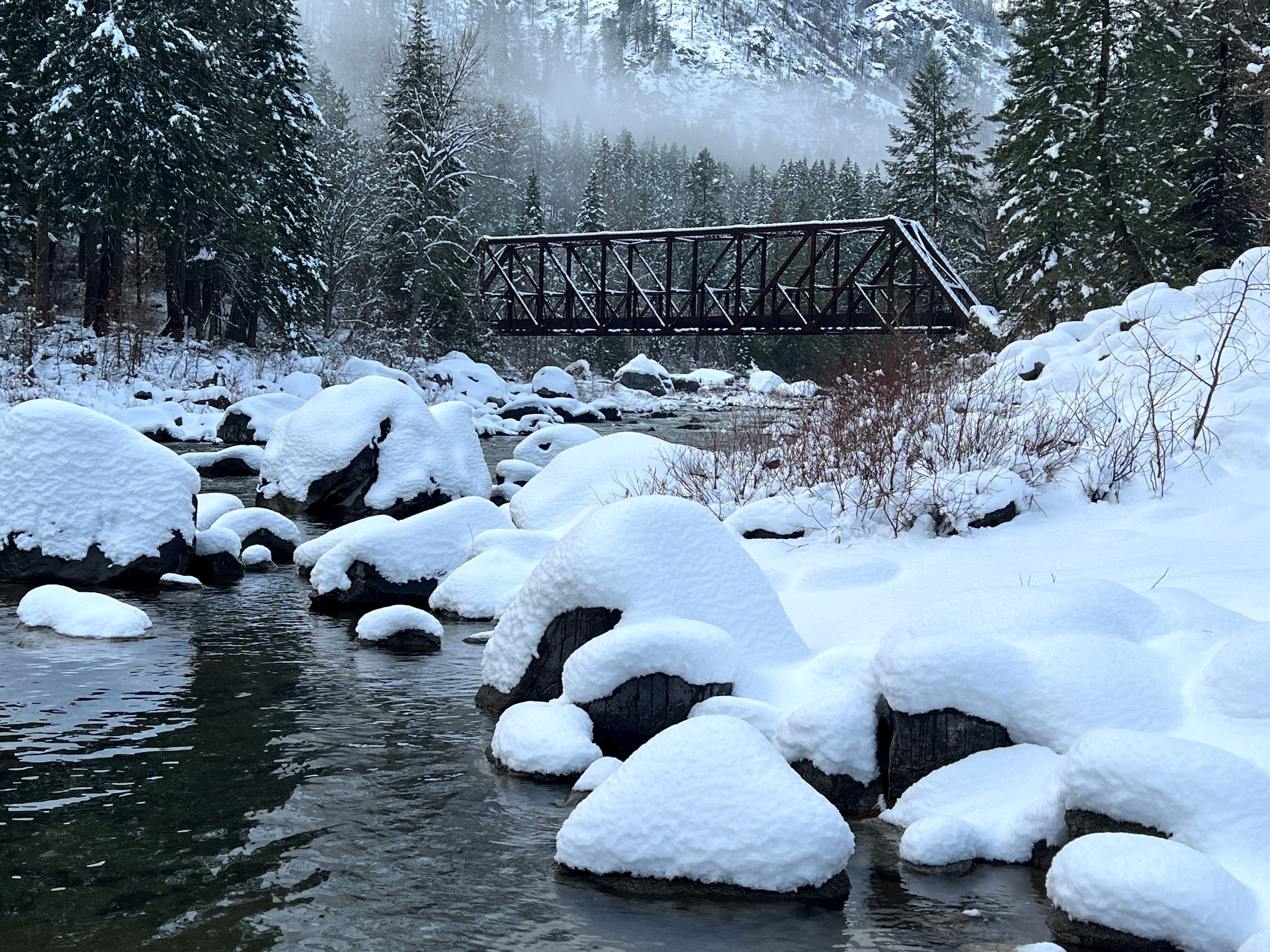A blanket of snow and the Tumwater Canyon Bridge on the Tumwater Pipeline Trail. Photo by joyoflandscapes.