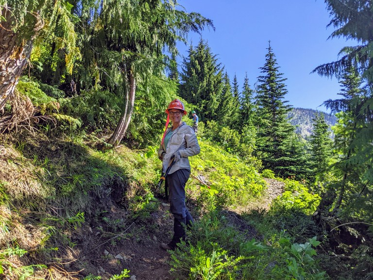 Volunteer smiles on a Bear-and-Pickhandle-Gap-BCRT July. Photo by Bob Zimmerman