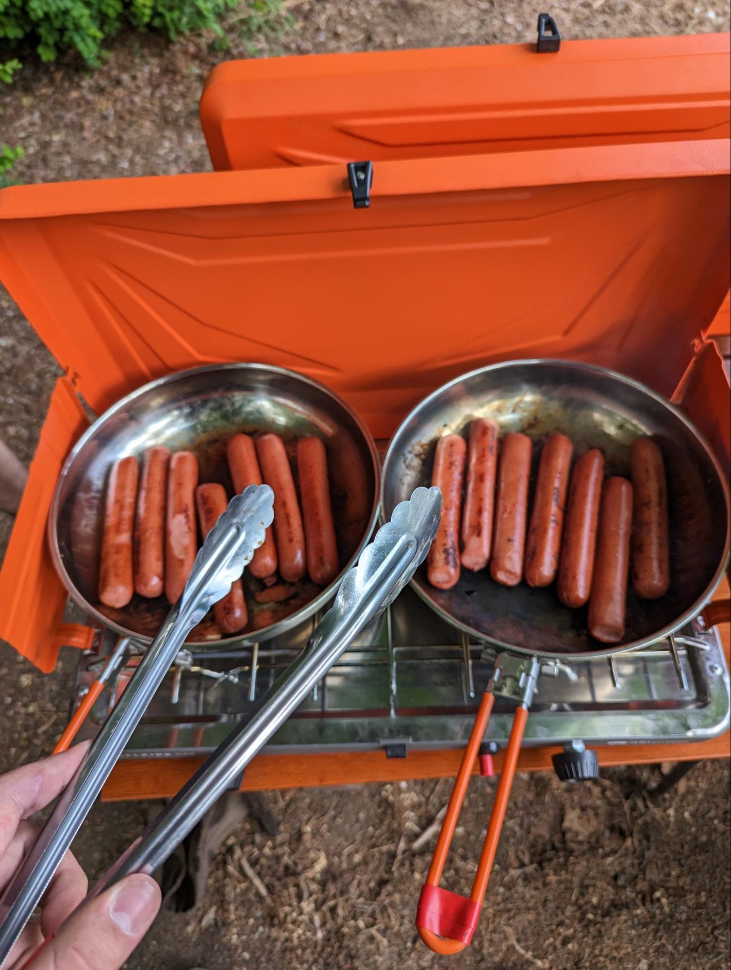 Hot dogs cooking camp stove