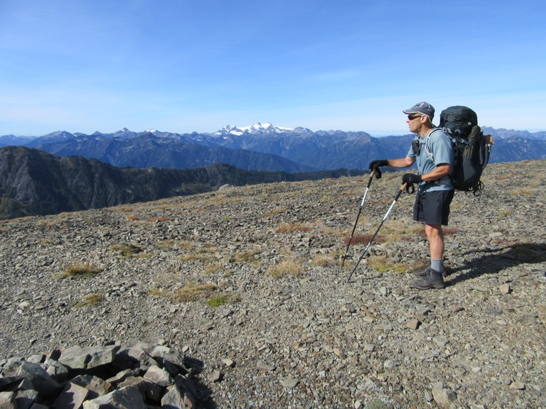 Craig takes in the view from a rocky high point in the backcountry.