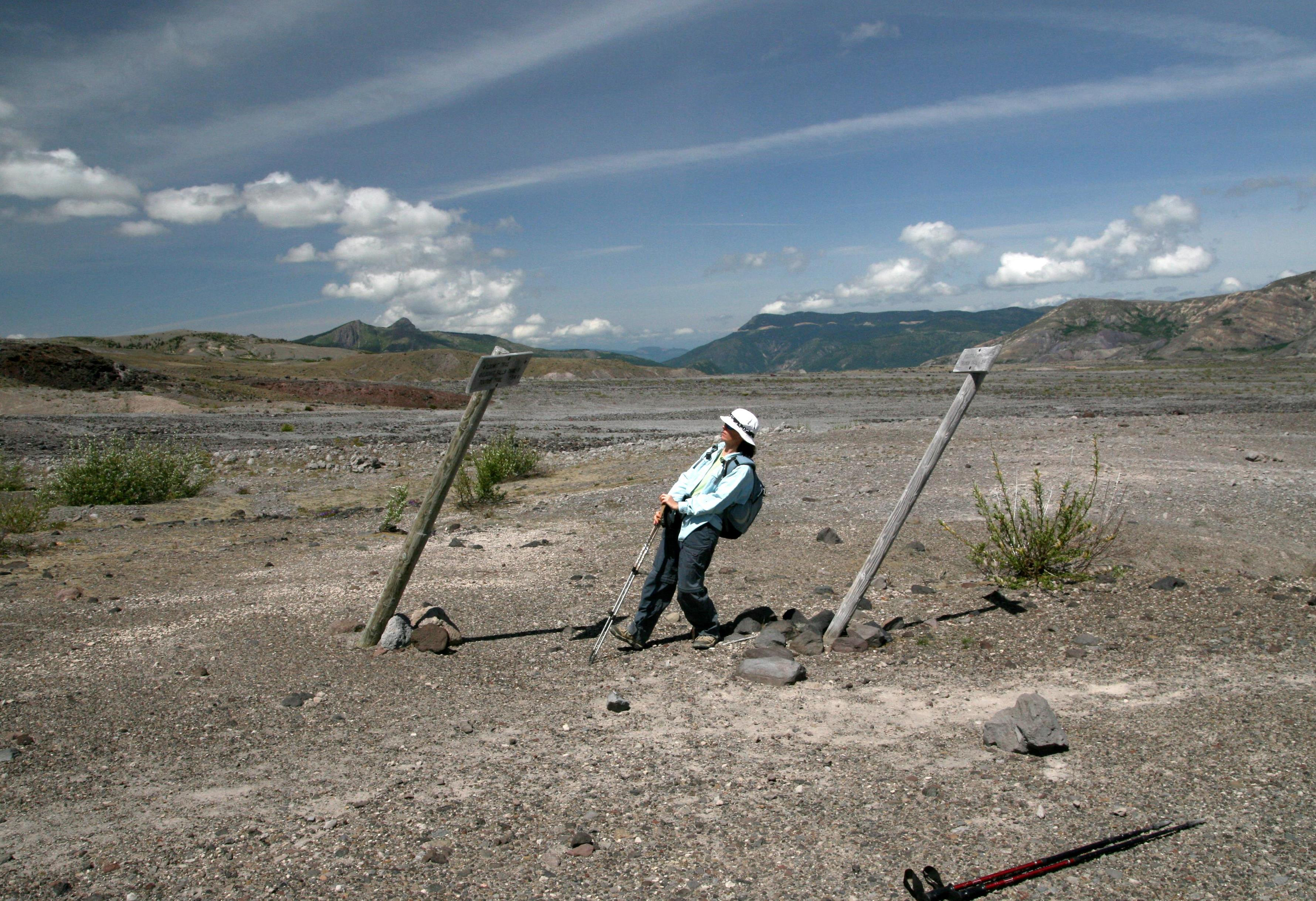 3rd hikers in action scott means A hiker leans to match to leaning posts in the blast zone of Mount St. Helens.