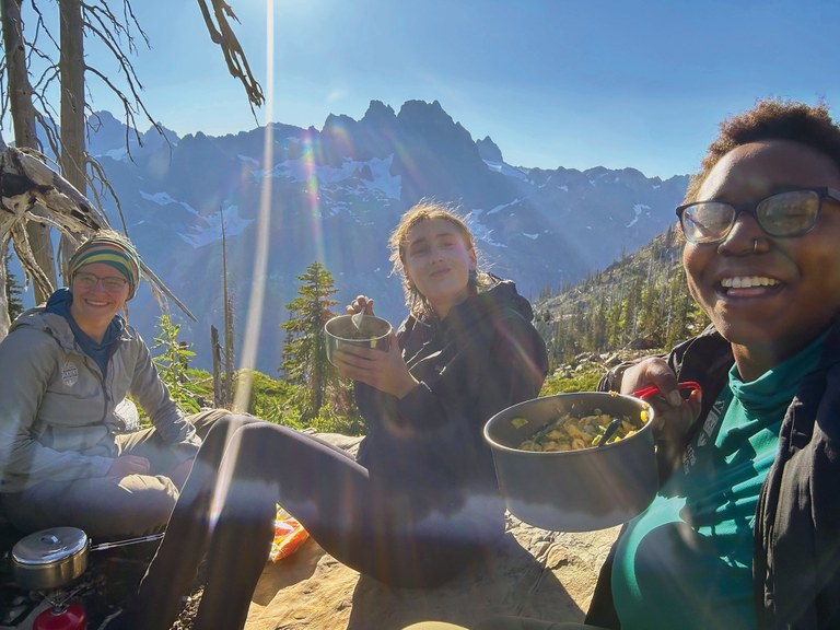 LTF pro crew members enjoy a meal from trail.