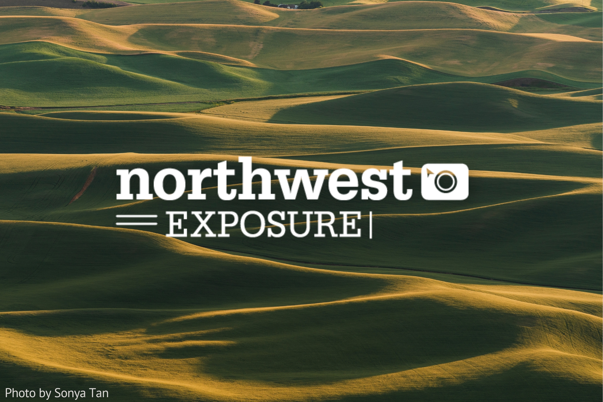 Rolling grass fields with Northwest Exposure Photo Contest logo