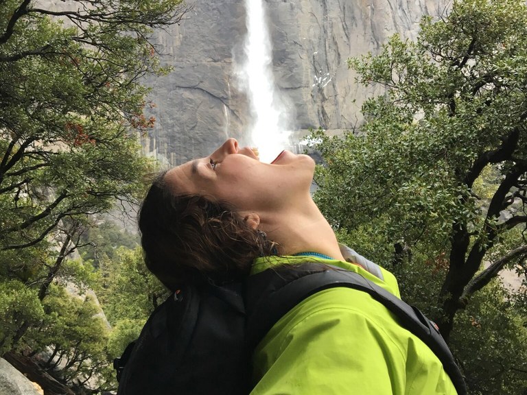 Bianca drinking a waterfall. Photo courtesy Bianca Fernandez.