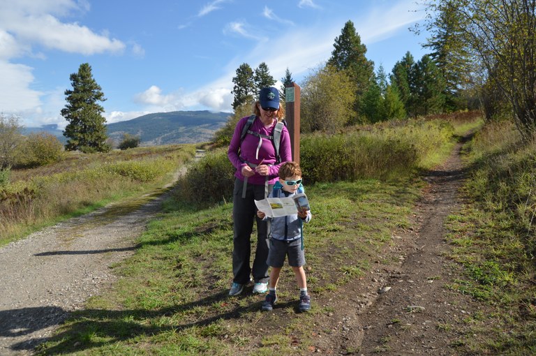 Giovanni reading a map at Kalamalka Lake Provincial Park.
