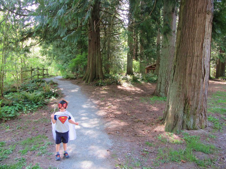 Giovanni dressed up as a superhero while hiking.