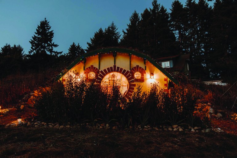 A small rental house designed to look like a hobbit hole.