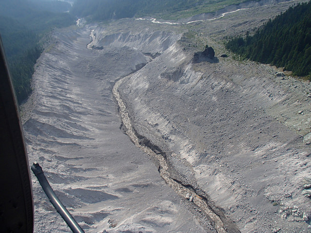 Flood cutting through debris field below glacier on Aug. 13. Photo by Scott Beason/NPS