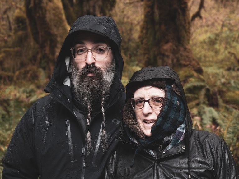 3rd Place Trail Family two hikers in the rain wearing coats