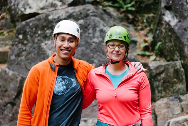 Tess and Travis smile after a successful climbing session. Photo by Erik Haugen-Goodman. 