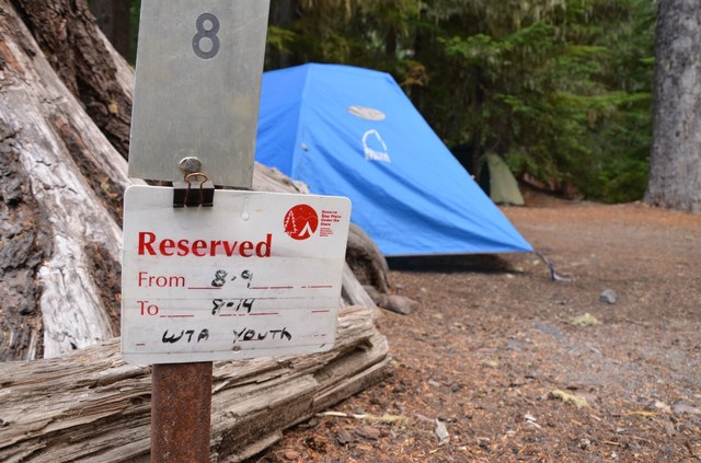 Some volunteer vacations are based out of campgrounds with picnic tables and bathrooms, like this one at Mount Rainier National Park. Other locations mean backpacking into a more rustric backcountry basecamp. Photo by Loren Drummond.