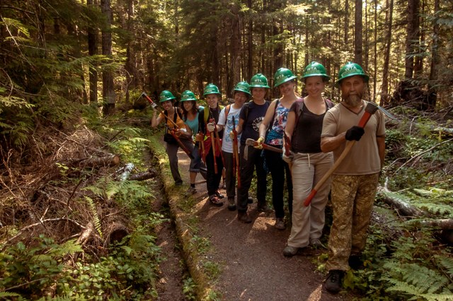 A WTA trail crew poses on the Salb Camp Creek Trail in Olympic National Forest. Photo by Peter Bose.