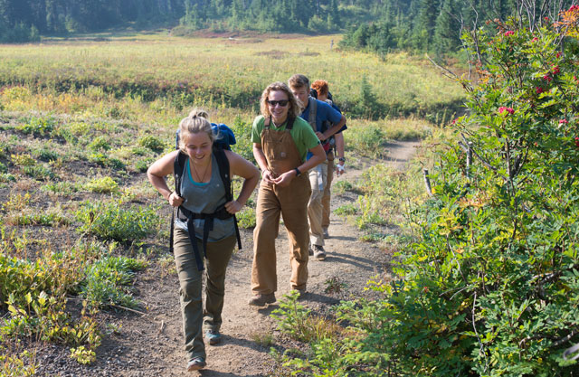 Youth volunteers hike to a work site on the PCT at Indian Pass in July, one of many projects supported in part by RTP. Photo by Erik Haugen-Goodman. 