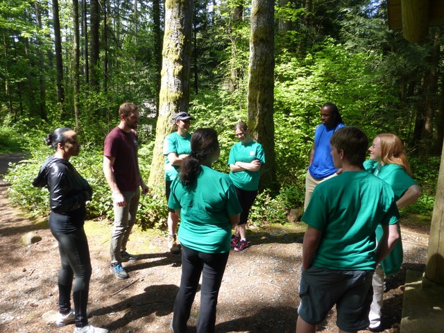 Andrew leads a discussion with hiking workshop participants at Tiger Mountain. Photo by Krista Dooley. 