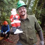 At last year's Santa work party, John was sporting a green hat. This year, he'll be rocking his new orange hat. Photo by Jon Nishimura. 