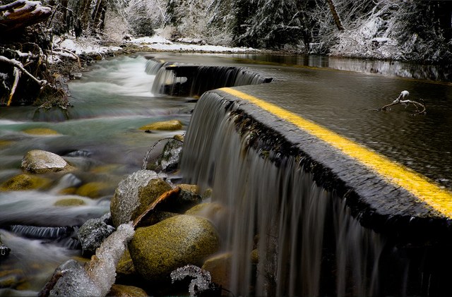 Damage on the Index-Galena Road. Photo by Dean Zulic.