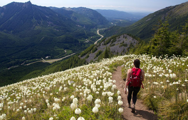 A hiker on the Ira Spring trail, which is within the Hansen Creek project area. Photo by abertino.