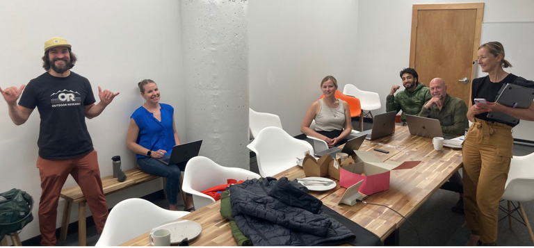Design team around a table at OR