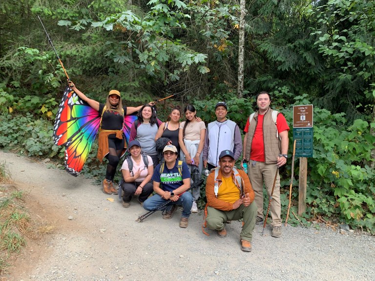 A group photo of an ECOSS in-language hiking group at the Little Si trailhead.