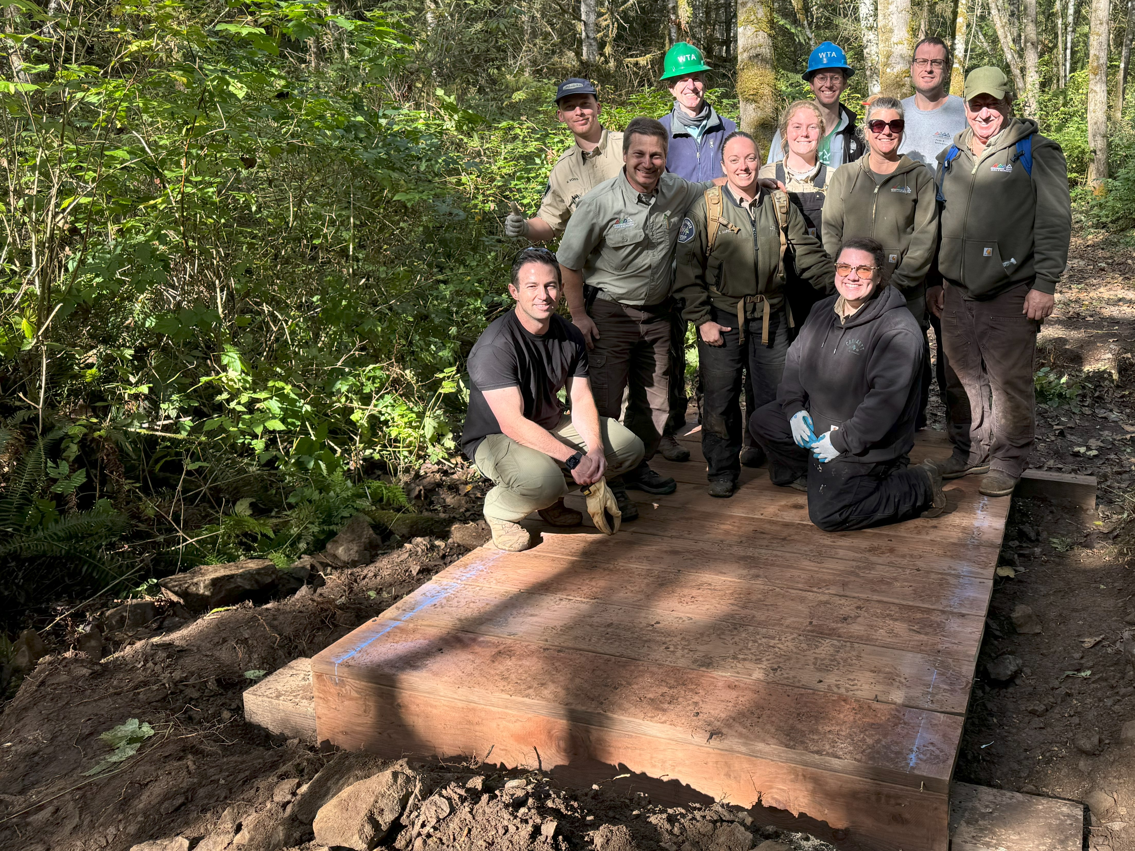 Snohomish County and WTA staff on the completed bridge
