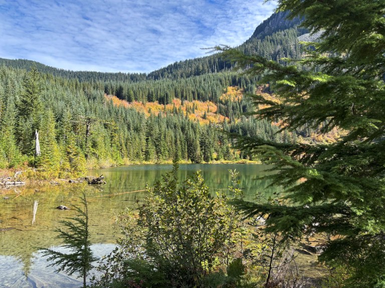Fall foliage surrounds one of the Granite Lakes, viewed from the trail. Photo by Katherine R.