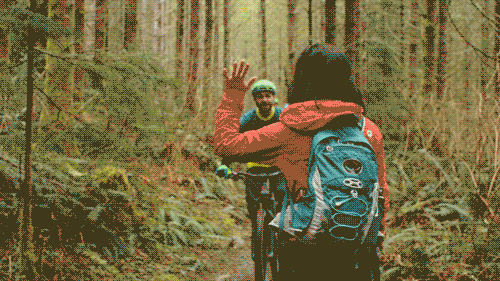 Trail users high five