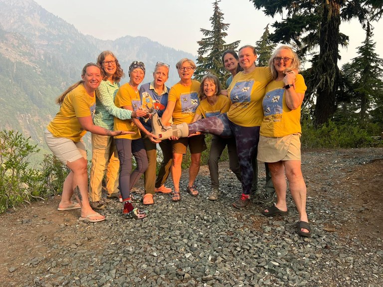 Hike-a-Thoners celebrating on trail. Photo by Lara Linde. 