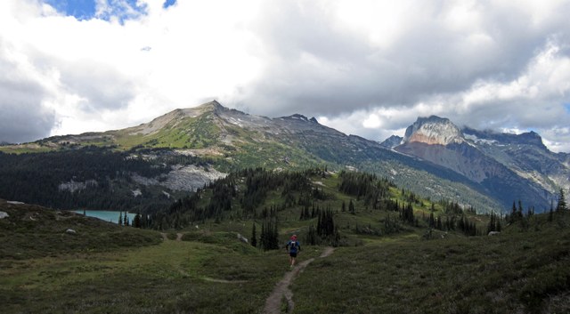 Ben descending to Lower Lyman with Cloudy Pass, Cloudy Peak, North Star and Bonanza Peak in the distance. Photo by Luke Distelhorst.