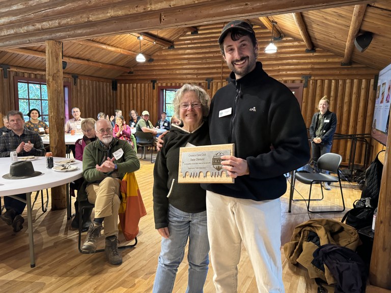 Puget Sound field manager, Joe Olybrych, recognizing Dede Chinlund with her crosscut award (500 work parties).Photo by Andrea Waite. IMG_6216.jpg