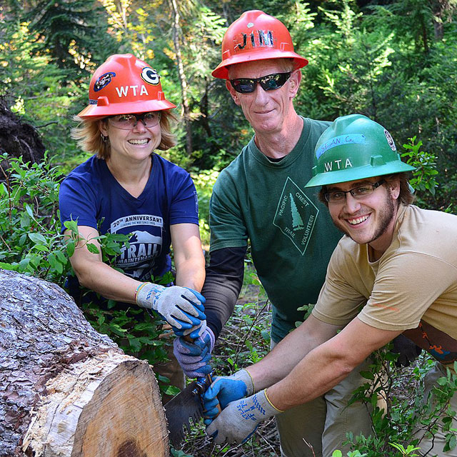 Jim Springberg pauses for a grin during a crosscut saw demo. Photo by Paul Bestock.