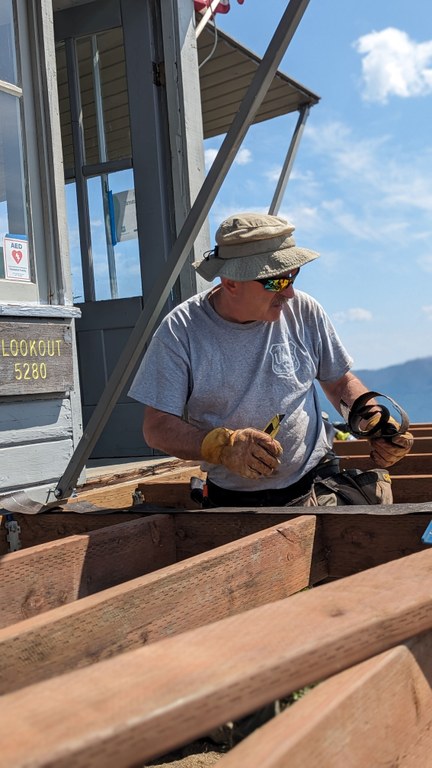 John Hearing working on the decking for the catwalk at the Suntop Lookout. 