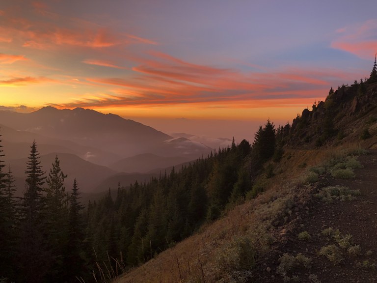A long view down a mountain valley at sunset. Photo by Suzanne Sowinska. 
