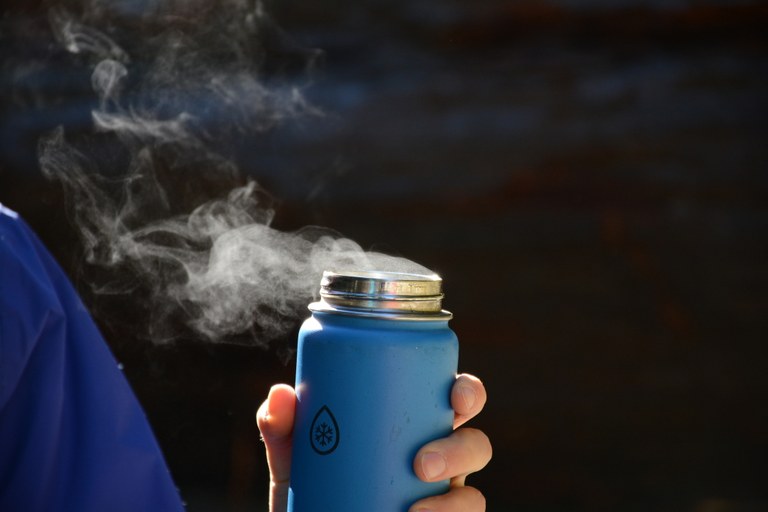 Coffee mug by Erika H. Coffee mug steaming held in hand