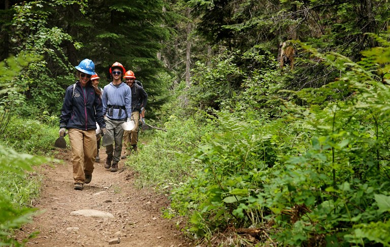 Trail crew walks towards project in the Teanaway. Photo by Britt Le