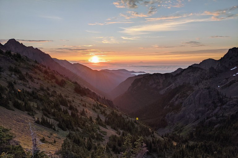 Sunrise over mountain ridge.