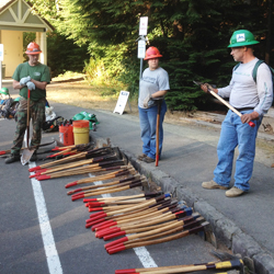 Before heading out to build the new Ape Cave Viewpoint Trail, volunteers get a safety briefing. Photo by Ryan Ojerio. 