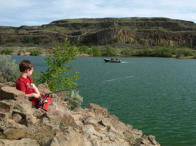 I tailored the mother-son getaway to my son's interests. In addition to hiking, we went paddle boating and he caught his first fish right here at Sun Lakes State Park. Photo by Susan Elderkin.