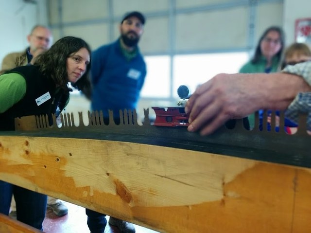 A WTA's 2-day Crew Leader College is just one way WTA works to pass down knowledge and skills. Here, Bud Sillman teaches the labor-intensive art of a cross-cut saw. Photo by Loren Drummond