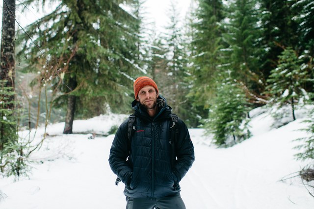 David Moskowitz on a field day with Conservation Northwest gathering wildlife track data over the winter. Photo by Karen Wang. 