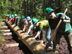 A youth crew works together on the Lone Fir trail. Youth volunteers did 15 percent of our trail work in 2012. 