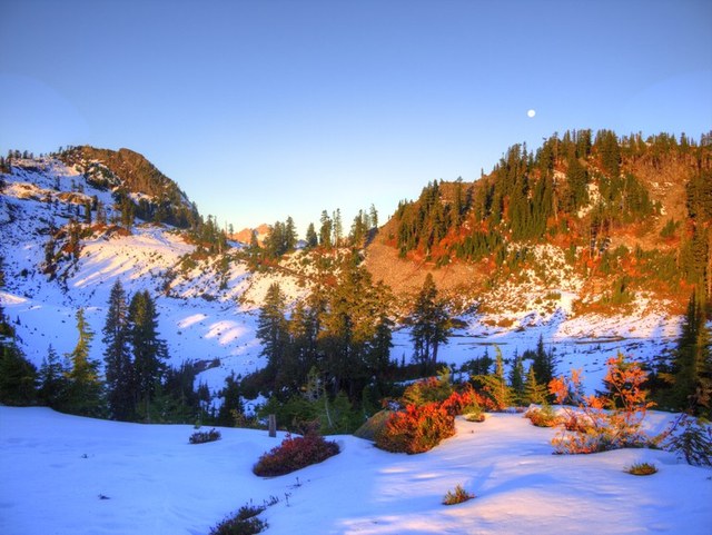 Snow, fall colors and a big moon on Railroad Grade. Photo by  KyleNicholson. 
