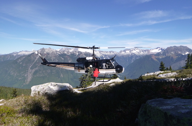 Helicopters are invaluable for inserting rescuers into remote locations, as well as for searching from the air and extracting and transporting injured subjects. Photo taken at Kindy Ridge by Yana Radenska.