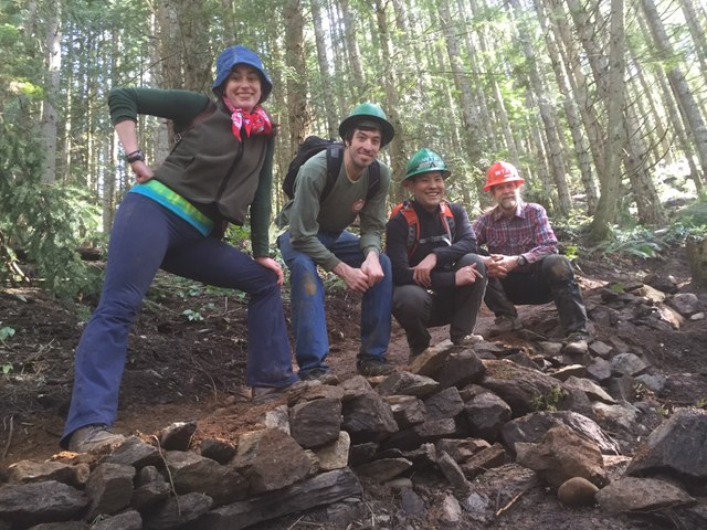 Volunteers taking a break on the Oyster Dome Trail. Photo by Arlen Bogaards.